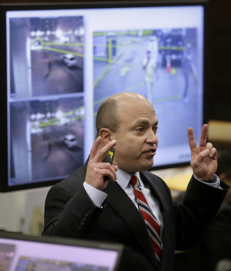 Assistant District Attorney Patrick Haggan makes closing arguments as video surveillance footage is projected on a screen in the trial of former New England Patriots tight end Aaron Hernandez at Suffolk Superior Court, Thursday, April 6, 2017, in Boston. Hernandez is on trial for the July 2012 killings of Daniel de Abreu and Safiro Furtado who he encountered in a Boston nightclub. The former NFL player is already serving a life sentence in the 2013 killing of semi-professional football player Odin Lloyd. (AP Photo/Steven Senne, Pool)