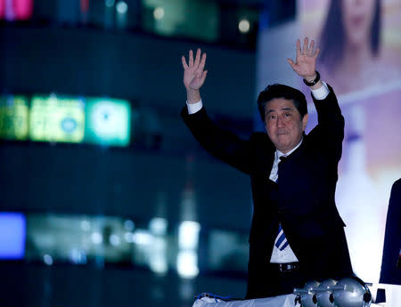 Japan's Prime Minister Shinzo Abe, who is also ruling Liberal Democratic Party leader, attends an election campaign rally in Tokyo, Japan October 18, 2017. REUTERS/Toru Hanai