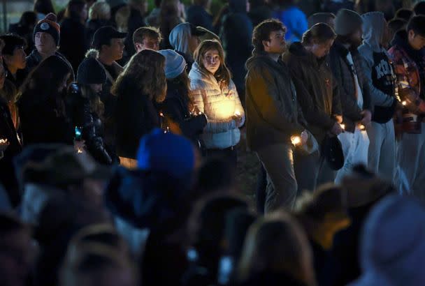 PHOTO: Members of the University of Virginia community attend a candlelight vigil on the South Lawn for the victims of a shooting overnight at the university, on Nov. 14, 2022 in Charlottesville, Va. (Win Mcnamee/Getty Images)