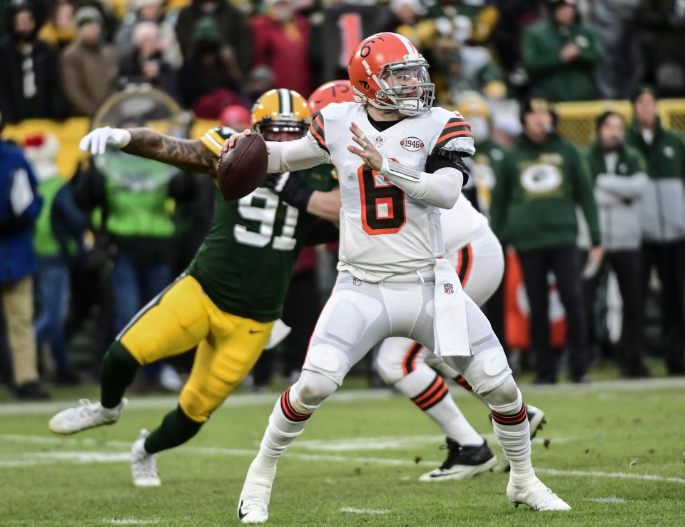 Dec 25, 2021; Green Bay, Wisconsin, USA;  Cleveland Browns quarterback Baker Mayfield (6) throws a pass in the first quarter against the Green Bay Packers at Lambeau Field. Mandatory Credit: Benny Sieu-USA TODAY Sports