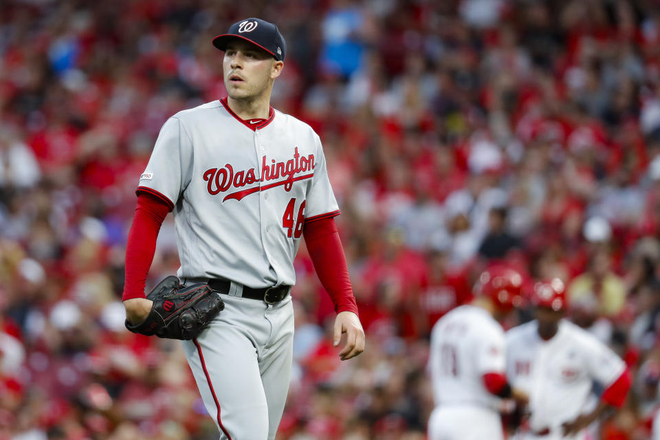 Washington Nationals starting pitcher Patrick Corbin walks to the dugout after being relieved in the fourth inning of a baseball game against the Cincinnati Reds, Friday, May 31, 2019, in Cincinnati. (AP Photo/John Minchillo)