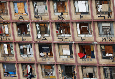 Windows of the abandoned Prestes Maia textile factory, occupied by a homeless movement, are seen in downtown Sao Paulo, Brazil, June 8, 2018. REUTERS/Nacho Doce