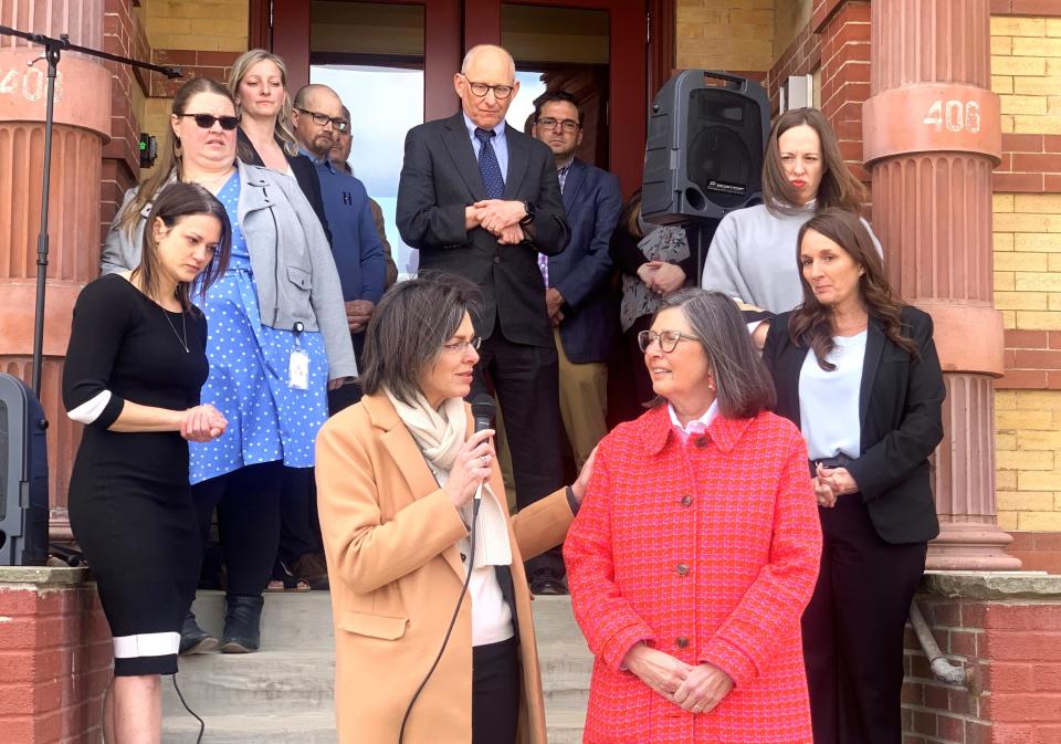 Susan Bull, left, CEO of Arbor Housing and development, discusses a rehabilitation project at 406 E. Church St. in Elmira with preservation architect Elise Johnson-Schmidt prior to a ribbon-cutting ceremony Thursday, March 28, 2024 for new affordable apartments.