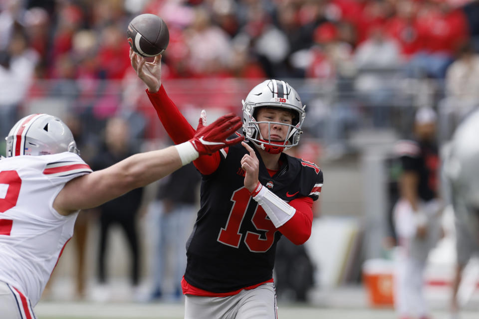 FILE - Ohio State quarterback Devin Brown throws a pass during an NCAA college spring football game Saturday, April 16, 2022, in Columbus, Ohio. With two-year starter C.J. Stroud off to the NFL, the competition for a new starting quarterback takes center stage as Ohio State begins spring practice. (AP Photo/Jay LaPrete, File)