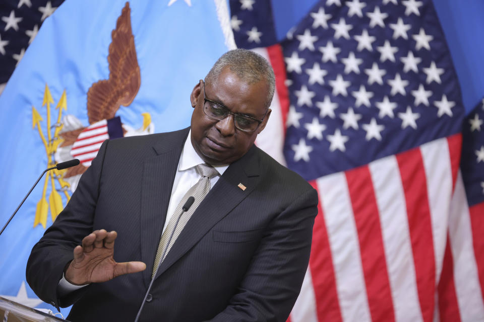 US Secretary of Defense Lloyd J. Austin III gestures as he speaks during a media conference after a meeting of NATO defense ministers at NATO headquarters in Brussels, Wednesday, Oct. 12, 2022. Ukrainian leaders are begging the U.S. and Western allies for air defense systems and longer-range weapons to keep up the momentum in their counteroffensive against Russia and fight back against Moscow’s intensified attacks. Austin says allies are committed to sending weapons “as fast as we can physically get them there.”(AP Photo/Olivier Matthys)