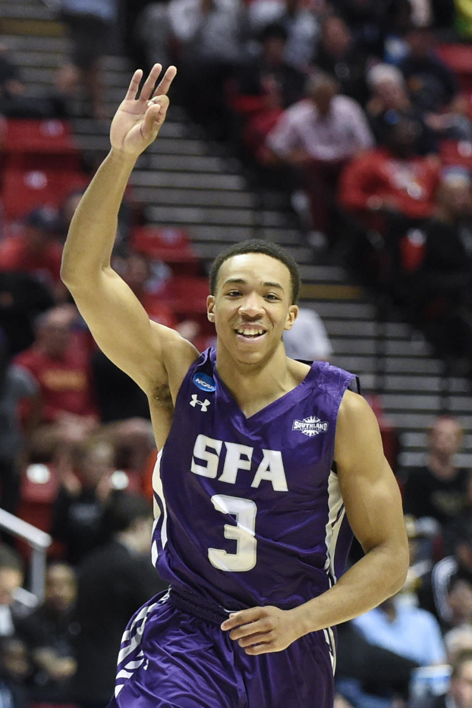 Stephen F. Austin guard Deshaunt Walker gestures while playing Virginia Commonwealth during the first half of a second-round game in the NCAA college basketball tournament Friday, March 21, 2014, in San Diego. (AP Photo/Denis Poroy)