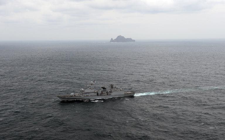 Handout photo taken on October 25, 2013 showing a South Korean warship conducting an operation near the Seoul-controlled islands known as Dokdo in Korea and Takeshima in Japan