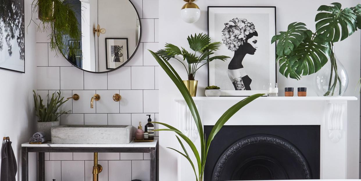 stylish bathroom with tiles and fireplace