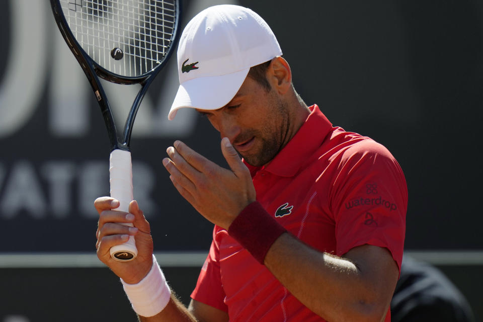 Serbia's Novak Djokovic reacts during a match against Chile's Alejandro Tabilo at the Italian Open tennis tournament in Rome, Sunday, May 12, 2024. (AP Photo/Alessandra Tarantino)