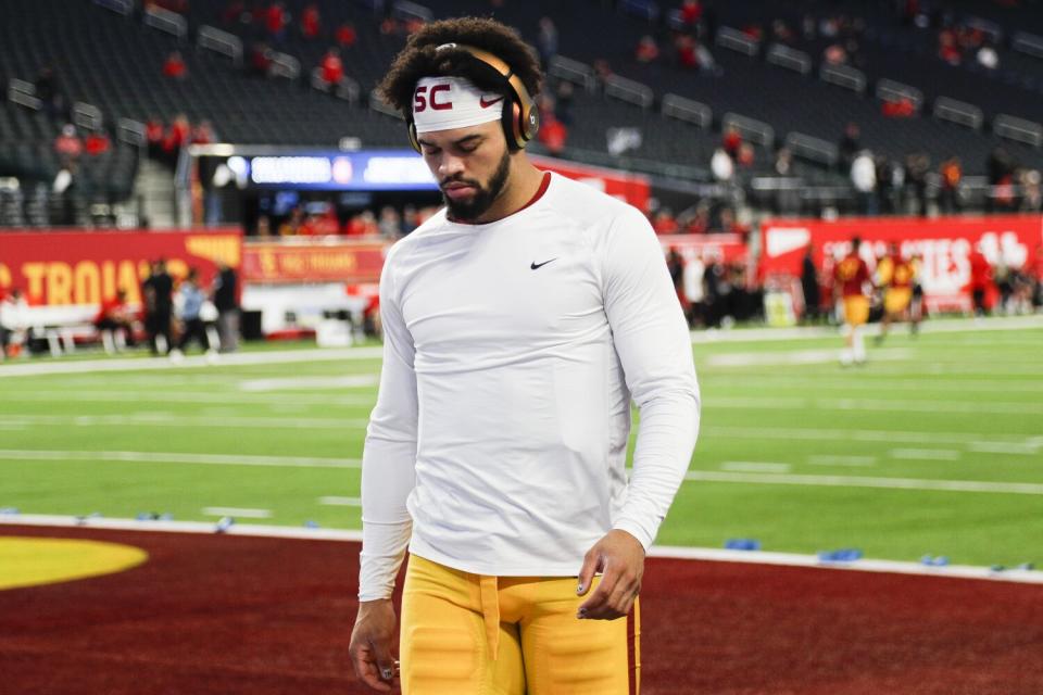 USC quarterback Caleb Williams wears headphones while warms up before the Pac-12 championship against Utah