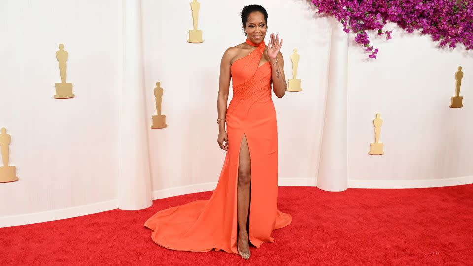 Regina King wore an eye-catching orange Atelier Versace gown with Pomellato jewelry. - Gilbert Flores/Variety/Getty Images