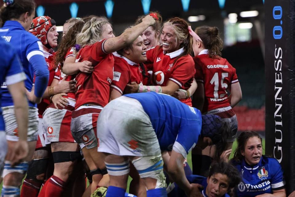 DELIGHT: Wales celebrate Sisilia Tuipulotu's match-winning try against Italy <i>(Image: Huw Evans Agency)</i>