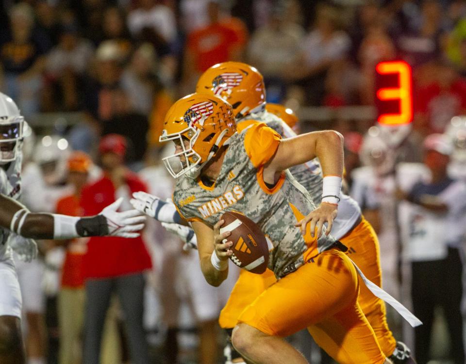 UTEP's Gavin Hardison attempts to escape the pocket against UNLV on Sept. 23, 2023 at the Sun Bowl.