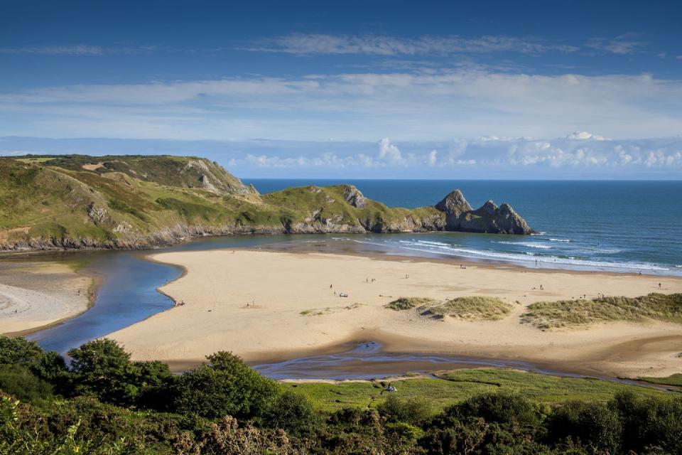 <p>Looking for a gorgeous beach in South Wales? Named after the three cliffs which frame it, Three Cliffs Bay is on the incredible Gower Peninsula and the perfect place for a dog-friendly staycation. You'll need to hike around a mile along the clifftops to reach its sands from the car park but the limited access means you won't find crowds on this spectacular stretch.</p><p><strong>Where to stay:</strong> Two kilometres from Three Cliffs Bay, this cottage on the outskirts of the village of Southgate is a family-friendly rental for five people in three bedrooms. There's easy access to the coastal path and the village has a shop, local pub and cafe. <a class="link " href="https://go.redirectingat.com?id=127X1599956&url=https%3A%2F%2Fwww.homeaway.co.uk%2Fp6493399%3Farrival%3D2020-07-21%26departure%3D2020-07-23&sref=https%3A%2F%2Fwww.countryliving.com%2Fuk%2Ftravel-ideas%2Fstaycation-uk%2Fg32996826%2Fbest-beaches-wales%2F" rel="nofollow noopener" target="_blank" data-ylk="slk:SEE INSIDE;elm:context_link;itc:0;sec:content-canvas">SEE INSIDE</a></p>