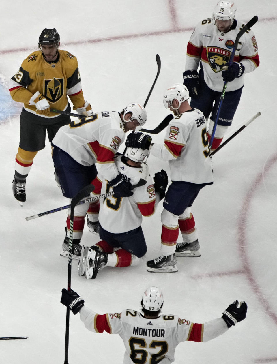 Florida Panthers celebrate after center Sam Reinhart (13) scored against the Vegas Golden Knights during the second period of an NHL hockey game Thursday, Jan. 12, 2023, in Las Vegas. (AP Photo/John Locher)