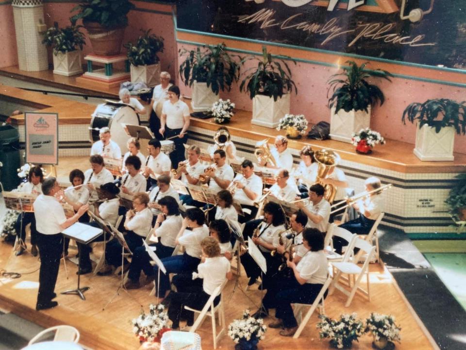 Uncle Sam's Band performs at McCamly Place in 1988-89 under the direction of Paul Reid.