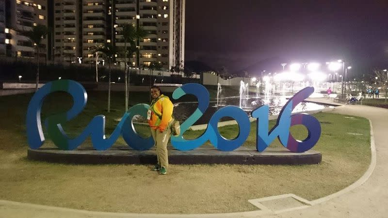 Claire Dawn-Marie Gittens poses with a Rio Olympics signage in Rio de Janeiro