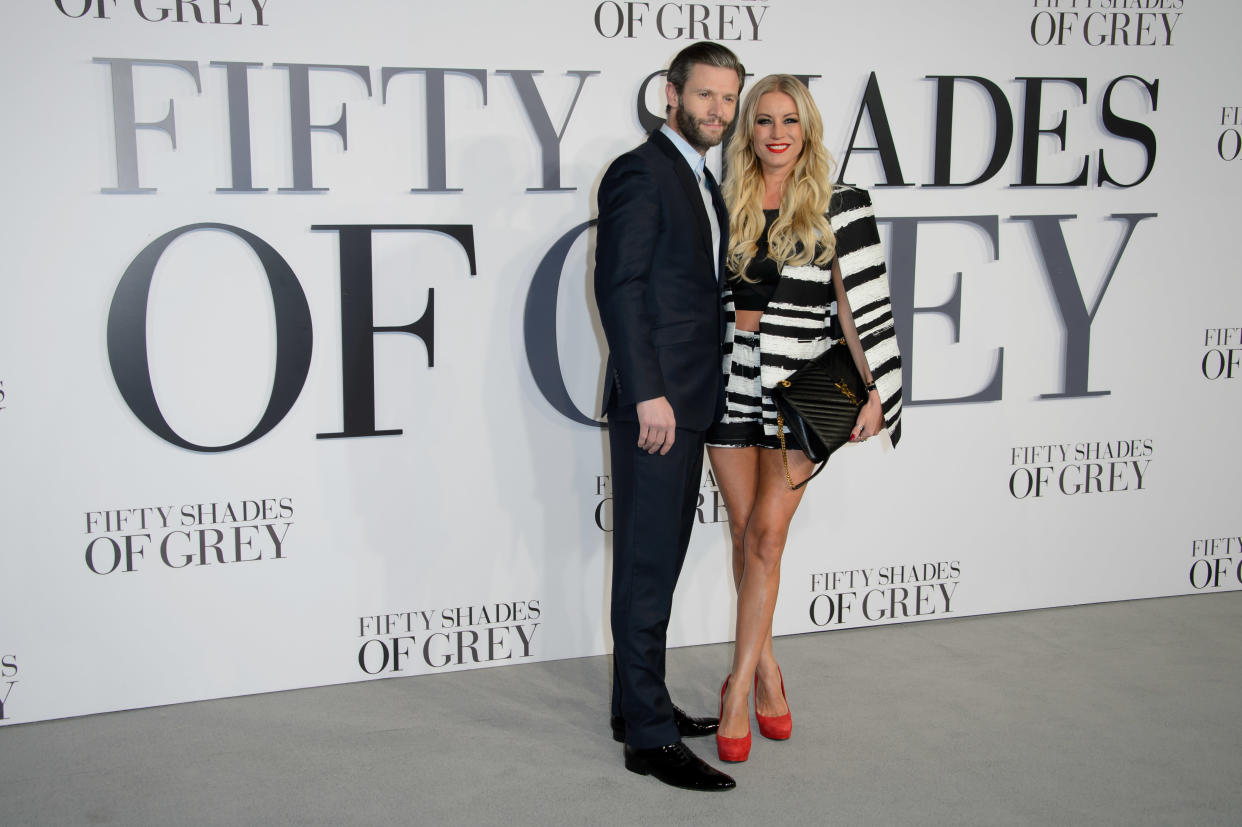 Denise Van Outen and Eddie Boxshall pose for photographers at the UK Premiere of Fifty Shades of Grey, at a central London cinema, Thursday, Feb. 12, 2015. (Photo by Jonathan Short/Invision/AP)