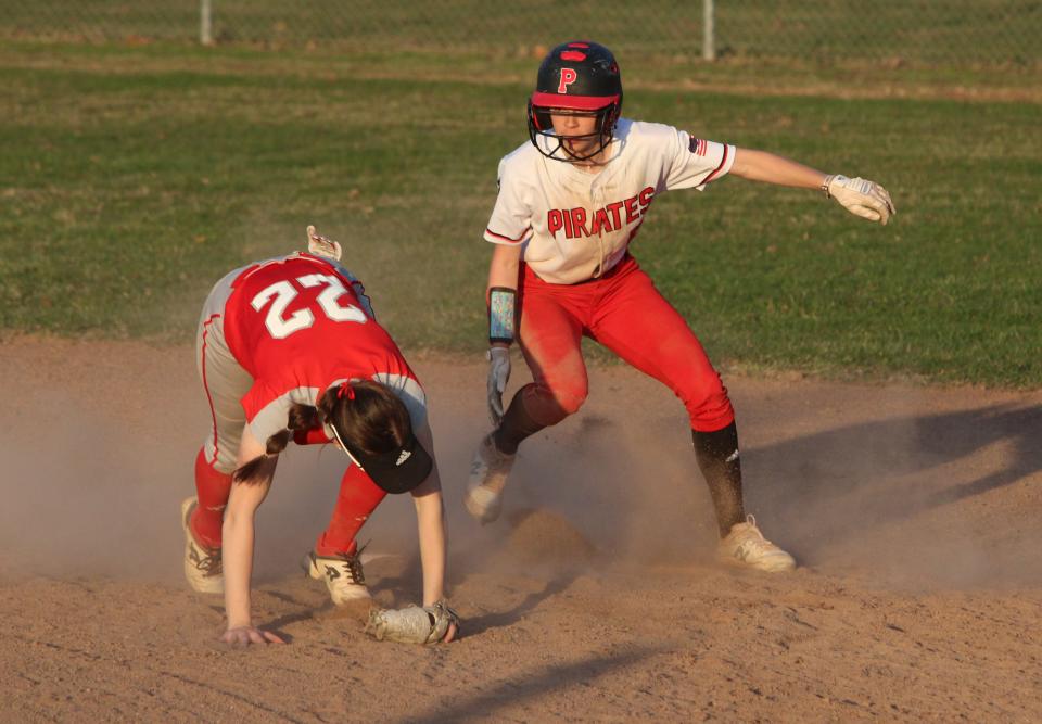 Pinckney's CeCe Thorington (right) stole three bases in a doubleheader sweep of Canton on Monday, April 10, 2023.