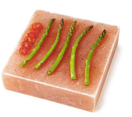 Get it on <a href="https://www.uncommongoods.com/product/himalayan-salt-bbq-plank" target="_blank">Uncommon Goods</a>, $29.99.