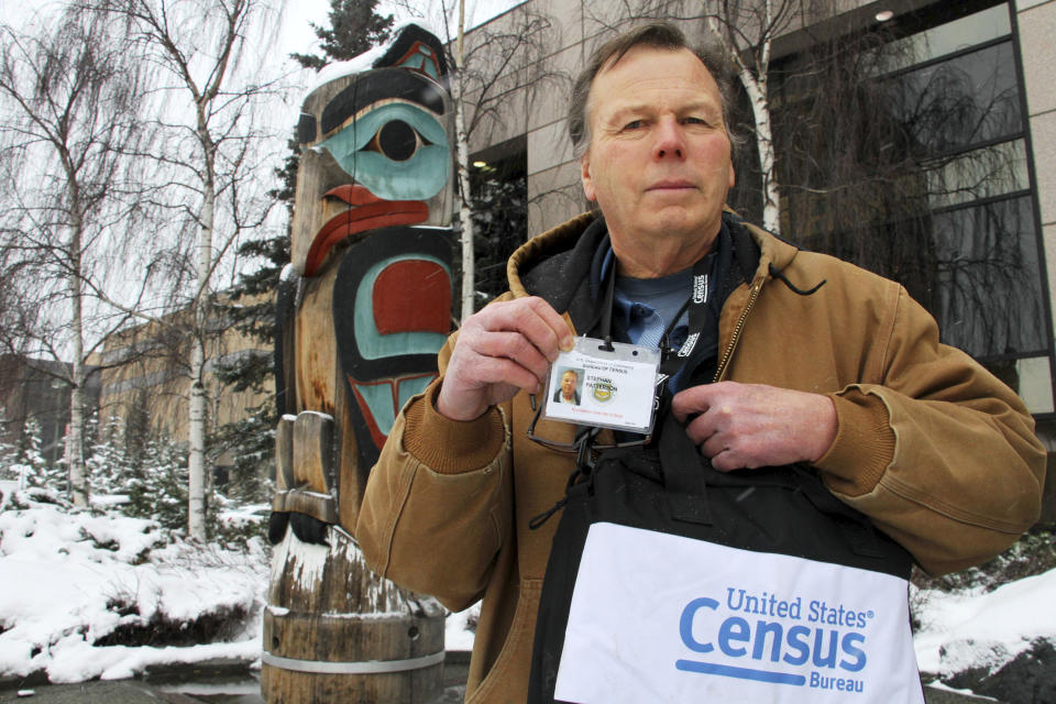 In this Friday, Feb. 21, 2020 photo, Stephan Patterson poses for a photo in Anchorage, Alaska. Patterson and other U.S. Census takers are reporting problems when conducting first-in-the-nation counts in rural parts of Alaska, including lack of communication about assignments, frustration with a smartphone app for filing time sheets and disappointment when they find out they are not being reimbursed for purchasing cold-weather gear. (AP Photo/Mark Thiessen)