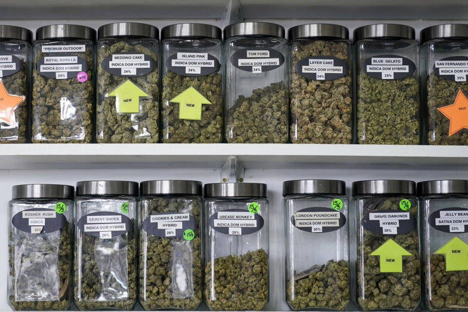 FILE — Marijuana products are displayed at the Good Leaf Dispensary, on the reservation Mohawks call Akwesasne, Monday, March 14, 2022, in St. Regis, N.Y. New York began accepting applications, Thursday, Aug. 25, 2022, to open its first crop of legal recreational pot shops, taking a novel approach by reserving the first licenses for people with past pot convictions or their relatives. (AP Photo/Seth Wenig, File)