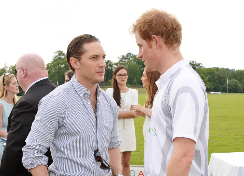 ASCOT, ENGLAND - JUNE 01:  Tom Hardy (L) and Prince Harry attend day two of the Audi Polo Challenge at Coworth Park Polo Club on June 1, 2014 in Ascot, England.  (Photo by David M. Benett/Getty Images for Audi)