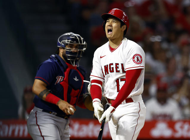 ANAHEIM, CALIFORNIA - AUGUST 12:  Shohei Ohtani #17 of the Los Angeles Angels reacts after a strike against the Minnesota Twins in the sixth inning at Angel Stadium of Anaheim on August 12, 2022 in Anaheim, California. (Photo by Ronald Martinez/Getty Images)