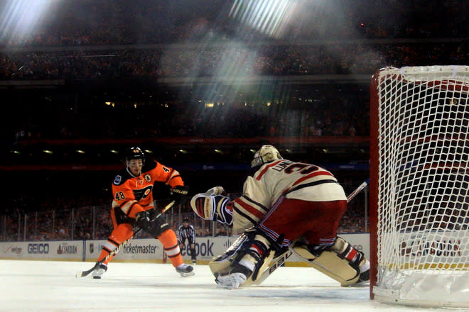 PHILADELPHIA, PA - JANUARY 02: Henrik Lundqvist #30 of the New York Rangers makes a save on a penalty shot by Danny Briere #48 of the Philadelphia Flyers late in the third period during the 2012 Bridgestone NHL Winter Classic at Citizens Bank Park on January 2, 2012 in Philadelphia, Pennsylvania. (Photo by Rob Carr/Getty Images)