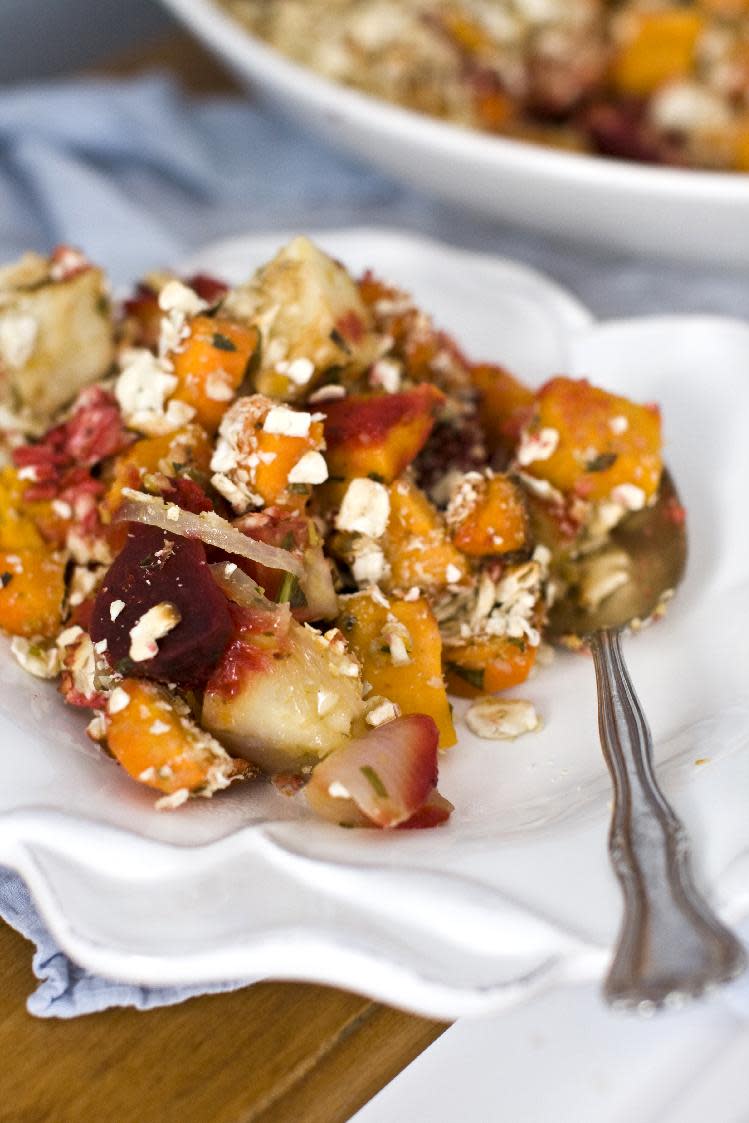 In this Feb. 27, 2012 photo, a root vegetable casserole sits on display, in Concord, N.H. Get your Passover Seder off to a healthy start with a flavorful root vegetable casserole. We seasoned it with citrus and herbs and added a crumb topping. In keeping with the kosher for Passover rules, we used crushed matzo in place of the more traditional breadcrumb topping that goes with casseroles. (AP Photo/Matthew Mead)