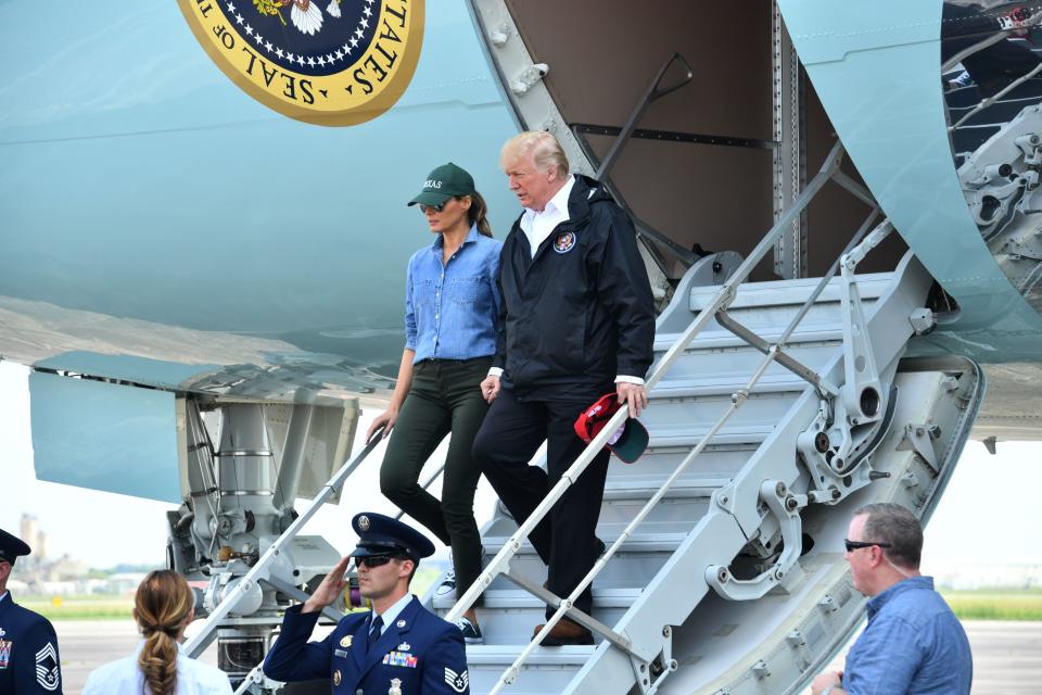 <p>President Donald Trump and First Lady Melania Trump arrive in Ellington Field in Houston on Sept. 2, 2017. (Photo: Nicholas Kamm/AFP/Getty Images) </p>