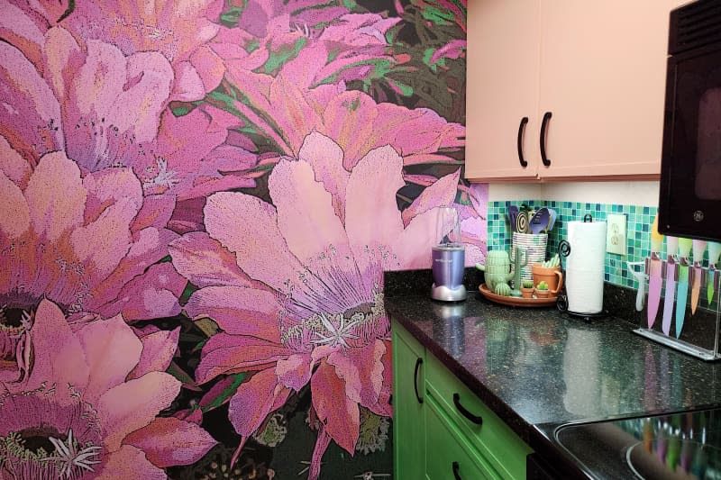 Floral wallpaper in colorful kitchen.