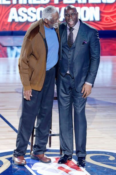 PHOTO: Former NBA players Bill Russell and Earvin 'Magic' Johnson Jr. are honored during the 2017 NBA All-Star Game in New Orleans, La., Feb. 19, 2017. (Jonathan Bachman/Getty Images, FILE)