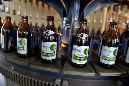 Bottles of beer are displayed at Halve Maan brewery in Bruges, Belgium, September 15, 2016. REUTERS/Eric Vidal