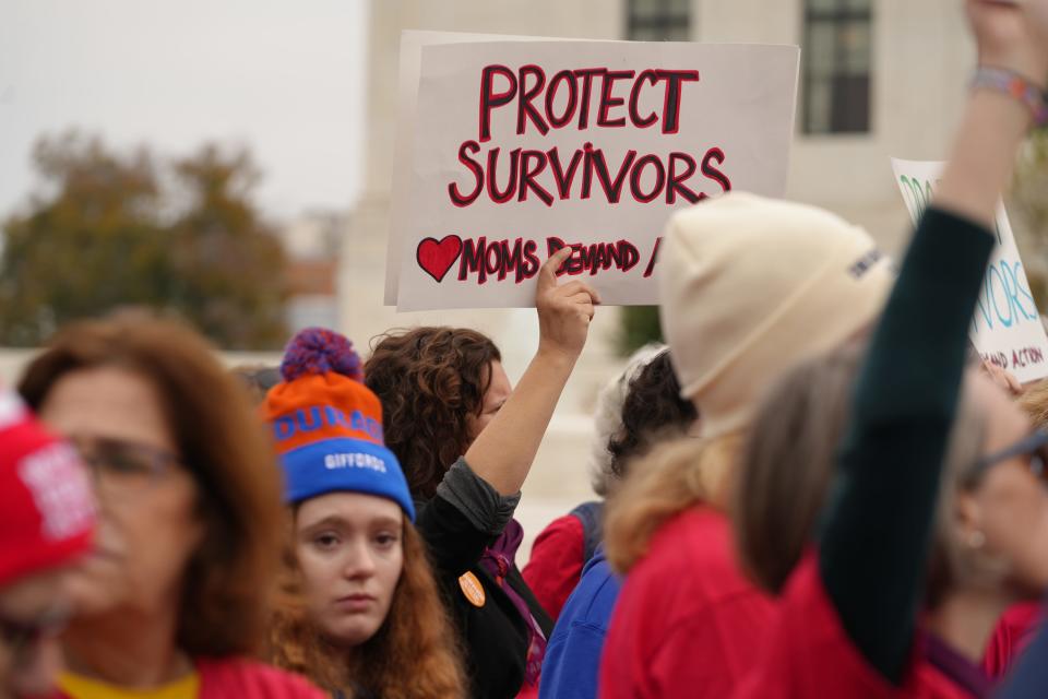 Gun control activists rally outside the Supreme Court on Washington on Tuesday, Nov. 7, 2023. The court will hear arguments in the case, U.S. v. Rahimi, about a challenge to a federal law that prohibits people from having guns if they are under a court order to stay away from their spouse, partner or other family members.