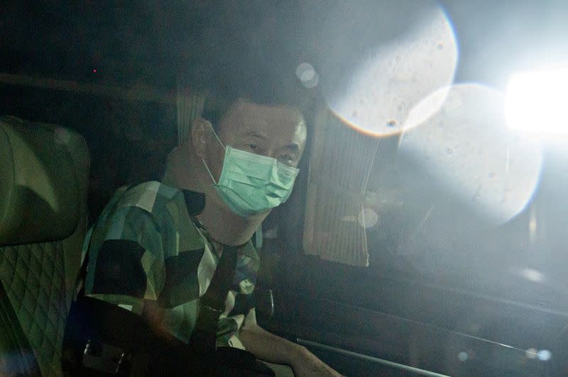 Thailand's former PM Thaksin Shinawatra leaves a police hospital after being granted parole, in Bangkok