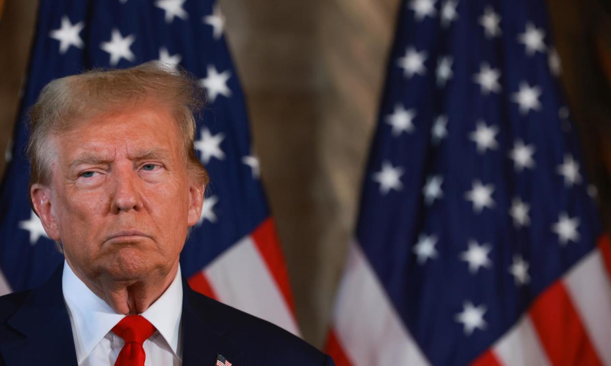 <span>Donald Trump attends a joint press conference with the speaker of the House, Mike Johnson, at Mar-a-Lago in Palm Beach, Florida, on Friday.</span><span>Photograph: Joe Raedle/Getty Images</span>