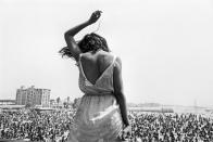 <p>Venice Beach Rock Festival, Calif., 1968. “Fifteen years since my first trip West, I have some new thoughts about gloryville. Every idea that Western man explores in his pursuit of the best of all possible worlds will be searched at the head lab — California. Technological and spiritual quests vibrate throughout the state, intermingling, often creating the ethereal. It is from this freewheeling potpourri of search that the momentary ensembles in space spring, presenting to the photographer his surrealistic image. However, to the Californians it is all so ordinary, almost mundane. The sensibility of these conditioned victims is where it is all at, right, left, up and down. Our future is being determined in the lab out West. There, a recent trip blew my mind across this state of being, as I collected images along the way to remember the transient quality of the Big Trip.” — Dennis Stock, September 1968 (preface to <em>California Trip</em>, Grossman Publishers, 1970). (© Dennis Stock/Magnum Photos) </p>