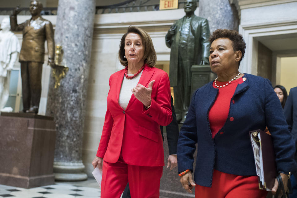 Speaker Nancy Pelosi (left) and Rep. Barbara Lee walk through the Capitol. Lee has led the fight to repeal the 2001 Authorization for Use of Military Force, which the House passed Wednesday. (Photo: Tom Williams via Getty Images)