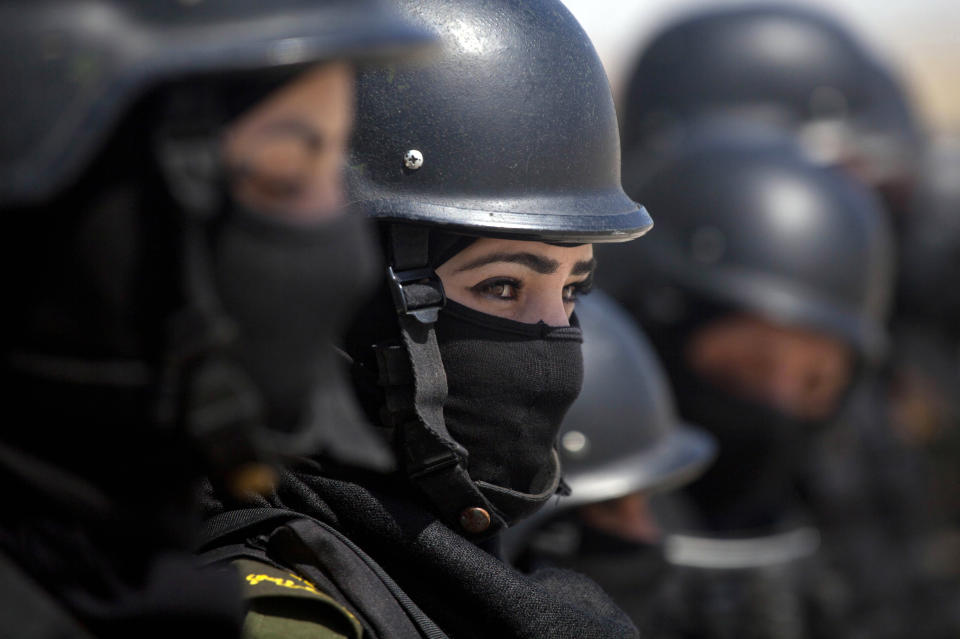 In this Sunday, April 6, 2014 photo, Palestinian women who will become a part of the elite Presidential Guard stand during a training in Jericho, West Bank. Twenty-five Palestinian women are set to become the first female members of the Presidential Guards, a Palestinian elite force of 2,600 men. (AP Photo/Dusan Vranic)