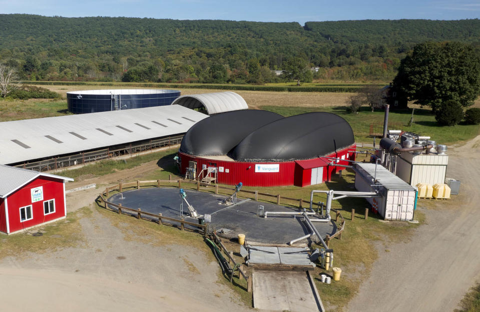 This September 2019 image provided by Vanguard Renewables shows a Farm Powered anaerobic digester facility in Deerfield, Mass. Dominion Energy is launching a $200 million effort to convert methane from cow manure into natural gas. (Chris Spencer/Vanguard Renewables via AP)