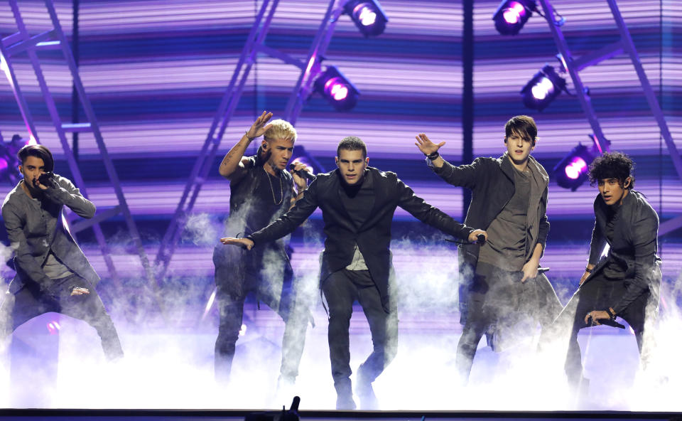 FILE - This April 26, 2018, file photo shows CNCO performing "Mamita" at the Billboard Latin Music Awards in Las Vegas on. The Latin American boy band CNCO is downsizing. The group announced on its official Instagram page Sunday, May 9, 2021, that 22-year-old Joel Pimentel is leaving the band, making the successful quintet a quartet.(Photo by Eric Jamison/Invision/AP, File)