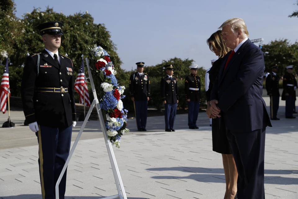 President Donald Trump and first lady Melania Trump pause after placing a wreath and will participate in a moment of silence honoring the victims of the Sept. 11 terrorist attacks, Wednesday, Sept. 11, 2019, at the Pentagon. (AP Photo/Evan Vucci)