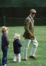 <p>Prince Philip with his grandchildren Peter and Zara at the Royal Windsor Horse Show.</p>