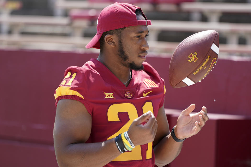 FILE - Iowa State running back Jirehl Brock poses for photographers during an NCAA college football media day, Aug. 2, 2022, in Ames, Iowa. Brock is among eight ISU and Iowa football players or staffers facing criminal charges Thursday, Aug. 10, 2023, in connection with the state's investigation into sports wagering at the two schools. (AP Photo/Charlie Neibergall, File)