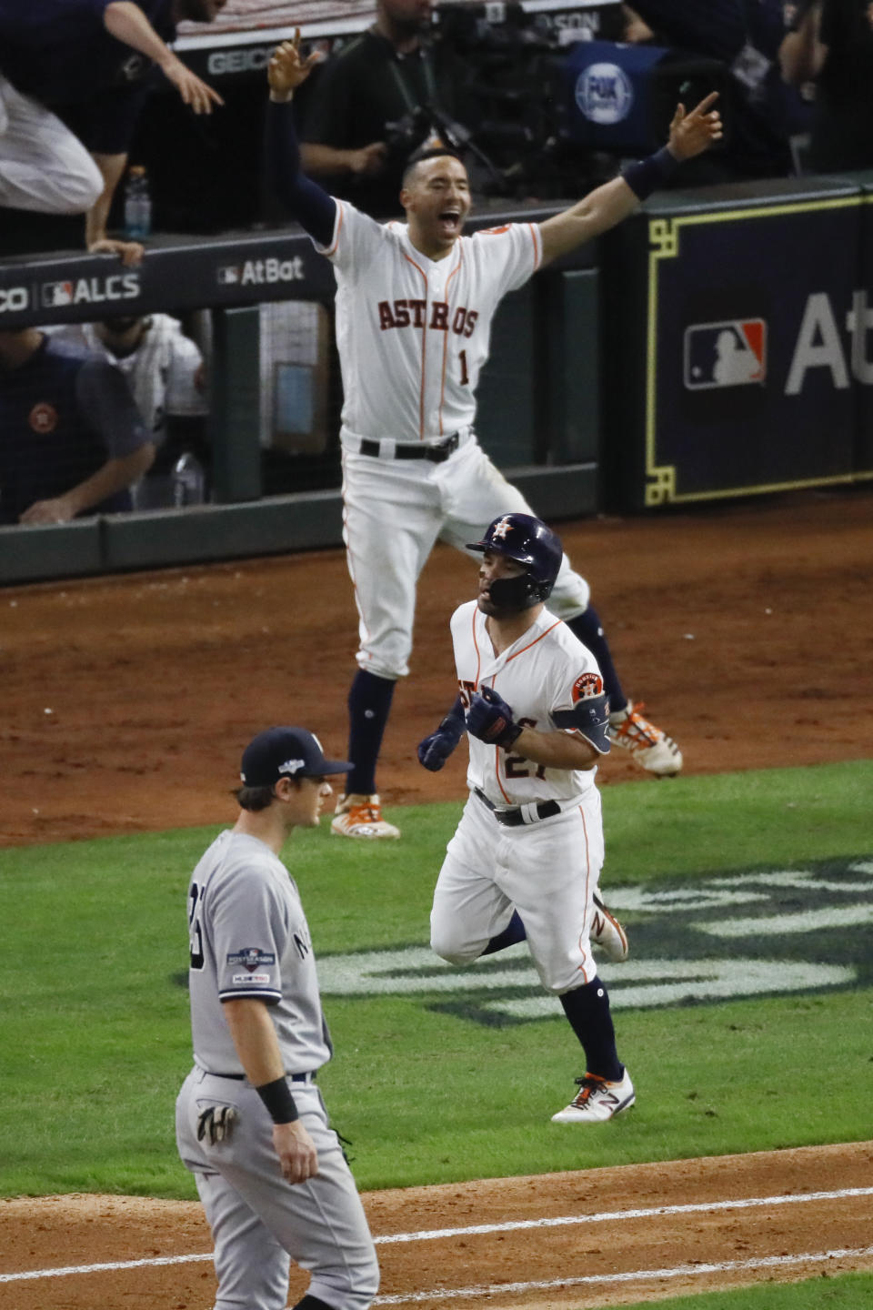 Houston Astros' Jose Altuve rounds the bases after a two-run walk-off to win Game 6 of baseball's American League Championship Series against the New York Yankees Saturday, Oct. 19, 2019, in Houston. The Astros won 6-4 to win the series 4-2. (AP Photo/Sue Ogrocki)