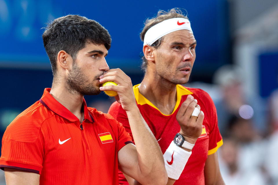 Carlos Alcaraz of Team Spain and Rafael Nadal of Team Spain interact against Austin Krajicek of Team United States and Rajeev Ram of Team United States during the Men's Doubles Quarter-final match on day five of the Olympic Games Paris 2024 at Roland Garros on July 31, 2024 in Paris, France (Photo by Andrzej Iwanczuk/NurPhoto via Getty Images)