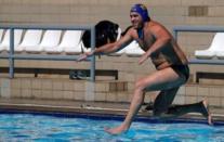 Water polo - Brazil men's team training - Rio de Janeiro, Brazil - 5/7/16 - Josip Vrlic jumps to the pool. REUTERS/Sergio Moraes