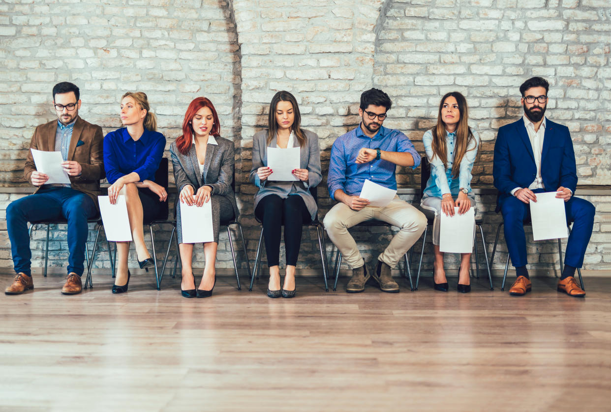 Photo of candidates waiting for a job interview