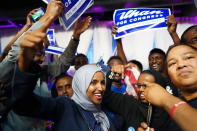 Minnesota Rep. Ilhan Omar, center, celebrates with her supporters after her Congressional 5th District primary victory, Tuesday, Aug. 14, 2018, in Minneapolis. (Mark Vancleave/Star Tribune via AP)